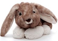 Plush rabbit lying 